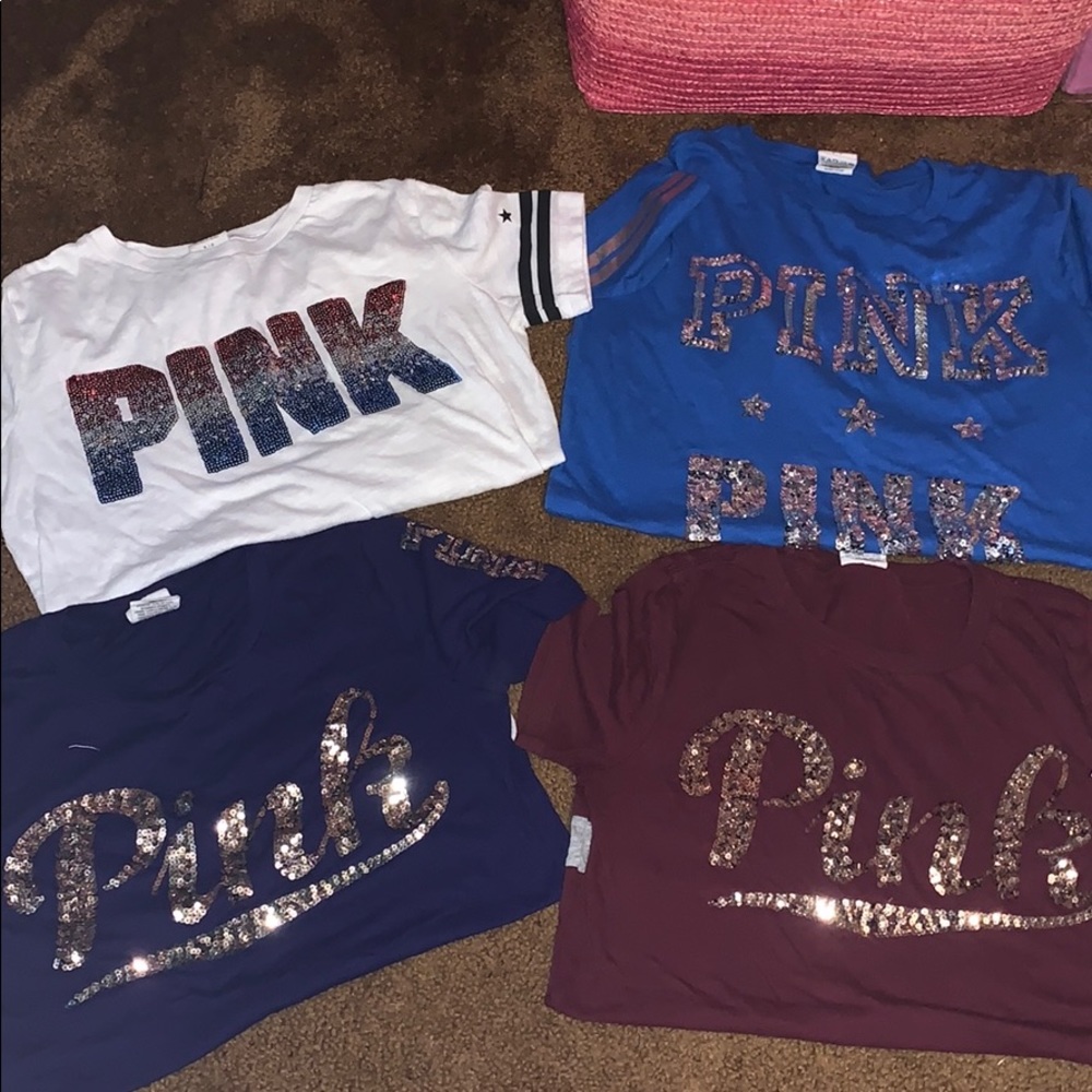 Four Victoria’s Secret T-shirts